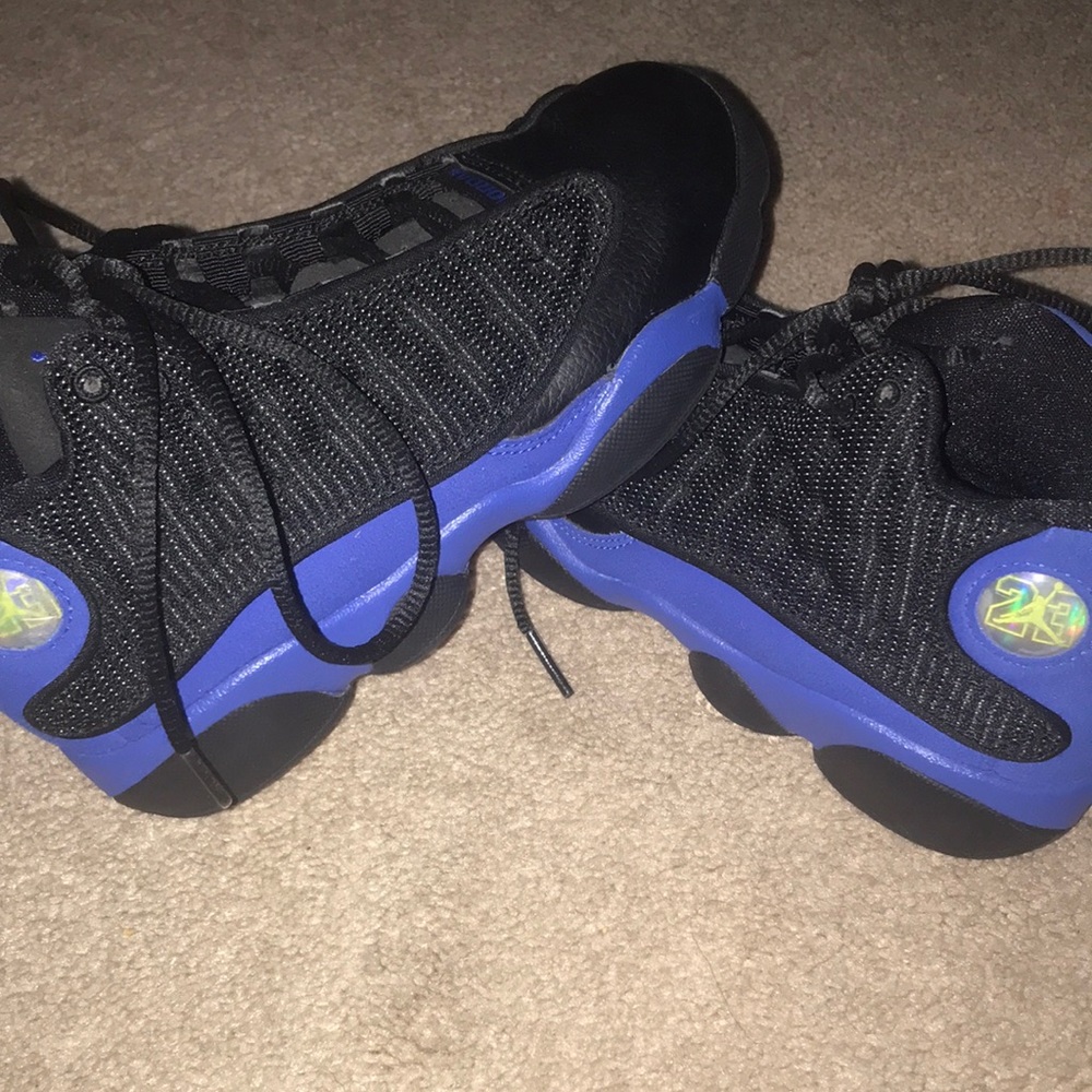Blue and black Jordans size 2